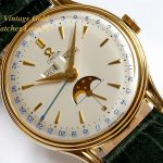 Omega ‘Cosmic’ Triple Date Moonphase 18K 1952 mobile navigation (1)