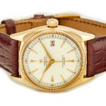 Rolex Oyster Perpetual Ref.6105 18ct 1952 Red Date mobile navigation (15)